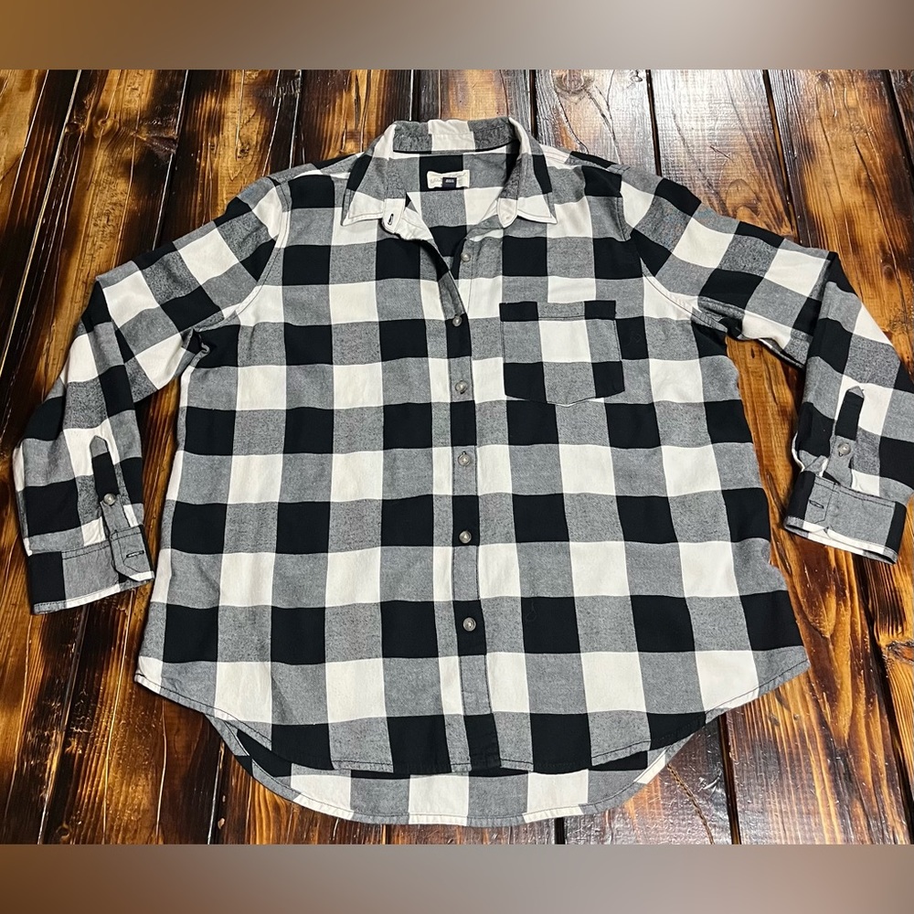 Black and white woman’s flannel.